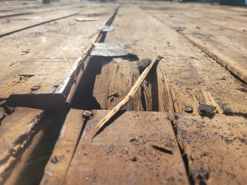 gaps, uneven surface, old roof decking
