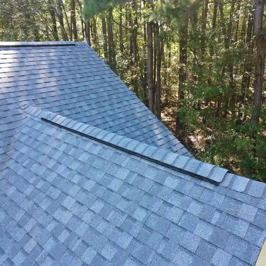 The Importance of Having Filtered Ridge Vent Instead of Unfiltered Ridge Vent 4 CertainTeed filtered ridge vent installed along ridge line of asphalt shingle roof